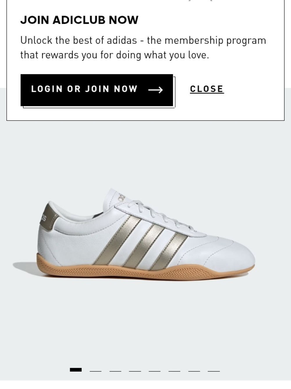 adidas White Athletic Sneakers with Metallic Gold Stripes